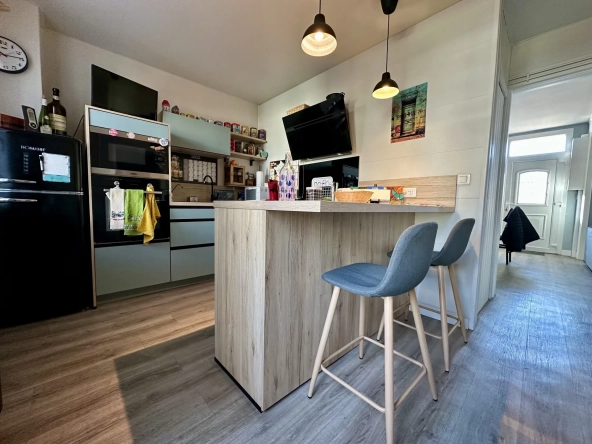 Maison spacieuse avec 3 chambres, garage et terrain clos à Saint-Aubin-lès-Elbeuf