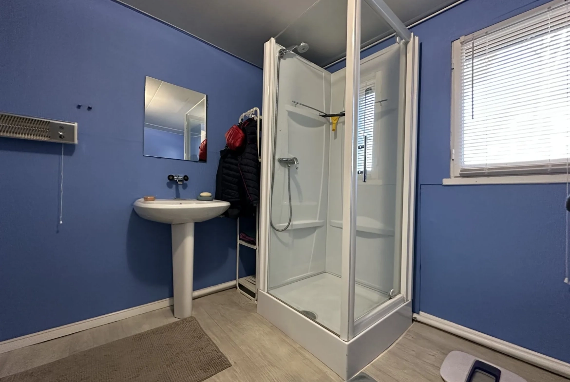 Maison spacieuse avec 3 chambres, garage et terrain clos à Saint-Aubin-lès-Elbeuf 