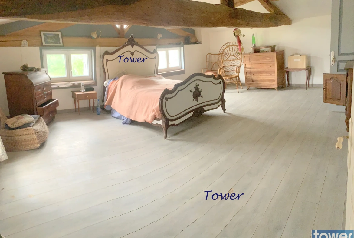 Maison 4 pièces de 126 m² à Les Touches de Périgny avec dépendances et garage 
