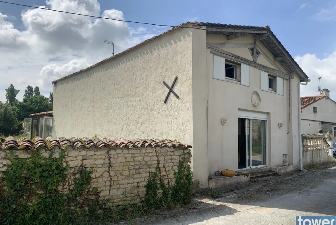 Maison 4 pièces de 126 m² à Les Touches de Périgny avec dépendances et garage 