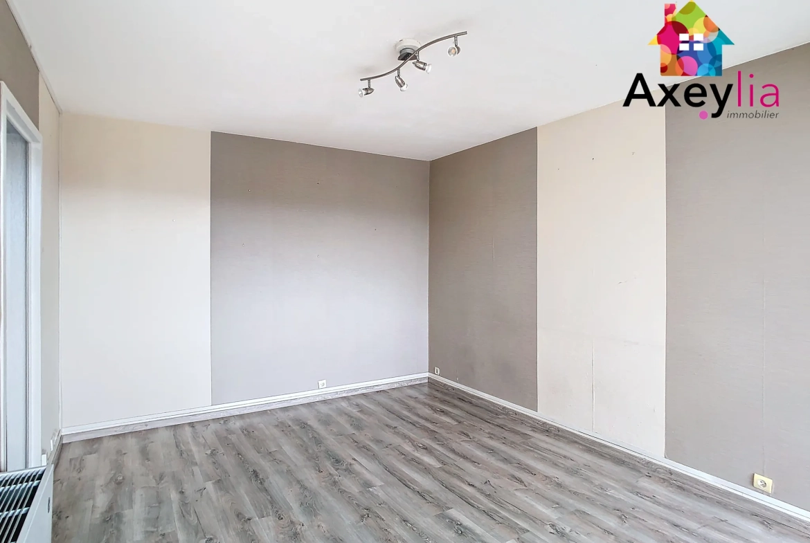 Appartement T3 lumineux avec balcon à Roanne - Secteur recherché 