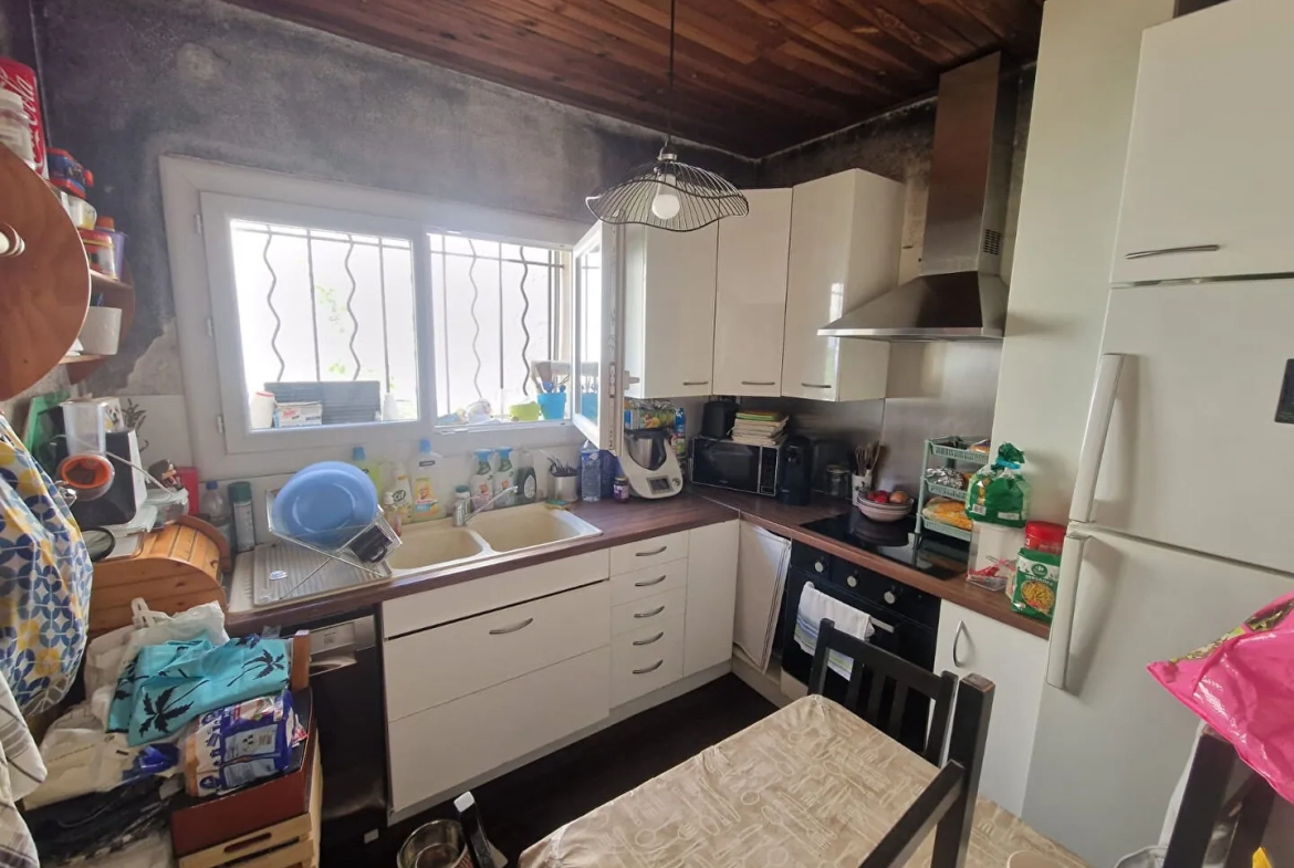Maison 59 m² avec garage et jardin à Gardanne, rénovation possible 