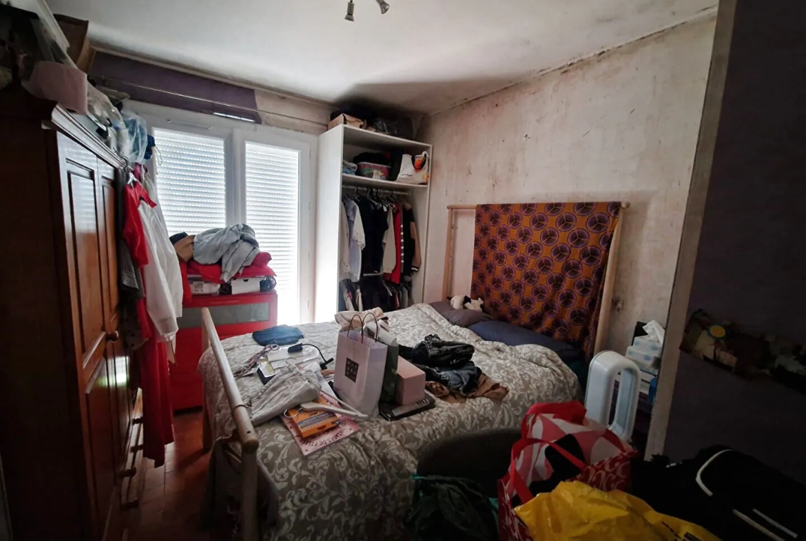 Maison 59 m² avec garage et jardin à Gardanne, rénovation possible 