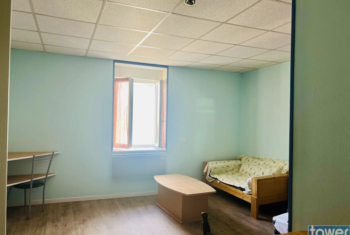 Immeuble de rapport à Gourdan-Polignan avec potentiel d’extension et jardin 