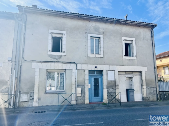 Immeuble de rapport à Gourdan-Polignan avec potentiel d’extension et jardin