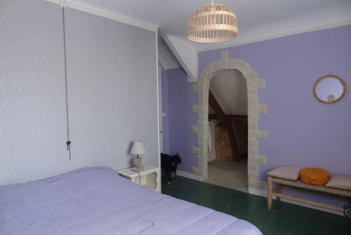 Maison de plain-pied avec jardin, garage à Saint Nicolas du Pelem 