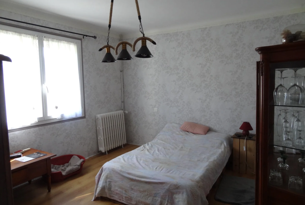 Maison de plain-pied avec jardin, garage à Saint Nicolas du Pelem 