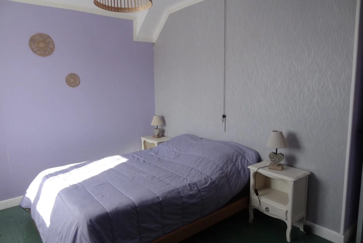 Maison de plain-pied avec jardin, garage à Saint Nicolas du Pelem 