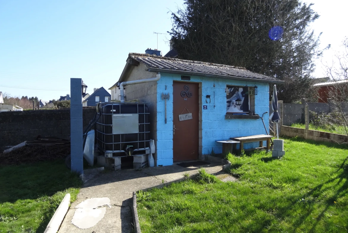 Maison de plain-pied avec jardin, garage à Saint Nicolas du Pelem 