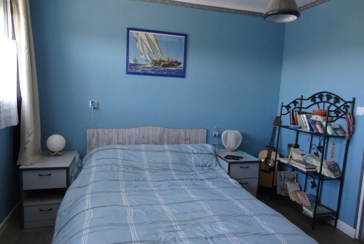 Maison de plain-pied avec jardin, garage à Saint Nicolas du Pelem 