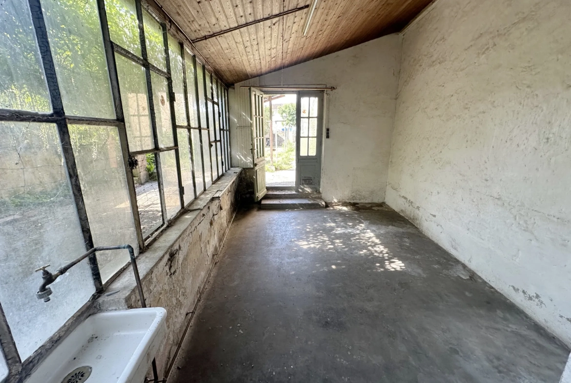 Maison en pierre avec grand garage à Sainte-Bazeille 47180 - Opportunité rare 