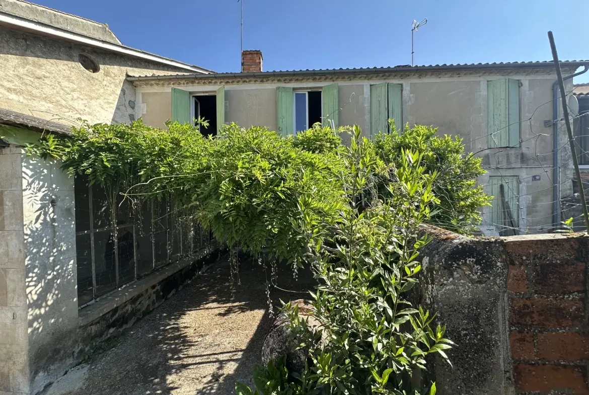 Maison en pierre avec grand garage à Sainte-Bazeille 47180 - Opportunité rare 