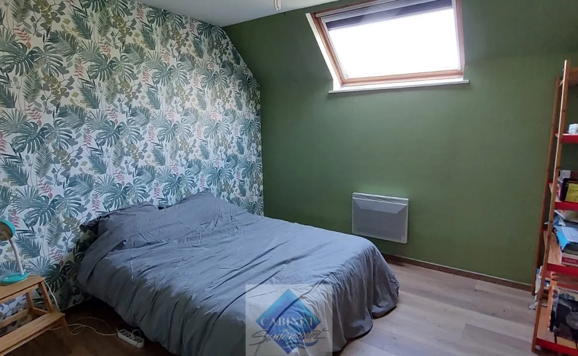 Maison spacieuse avec 3 chambres et 2 garages en centre-ville d'Abbeville 