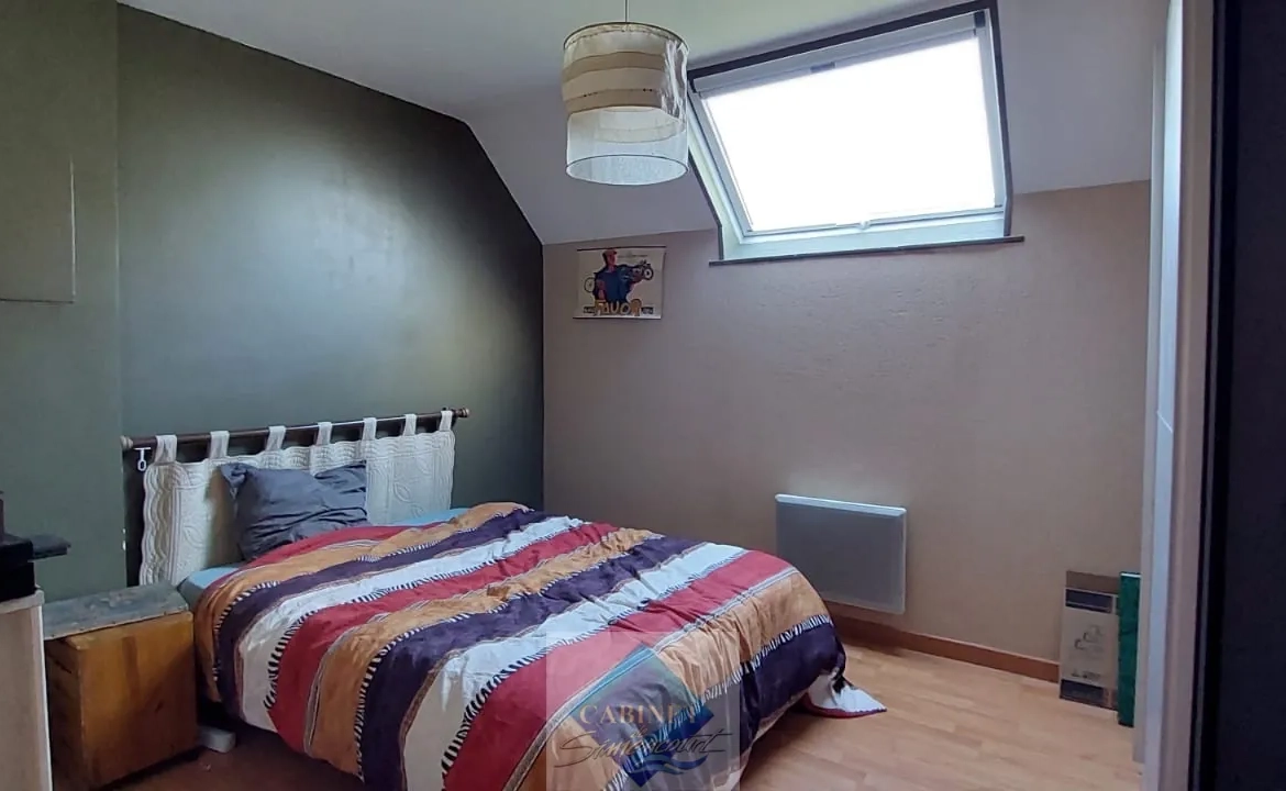Maison spacieuse avec 3 chambres et 2 garages en centre-ville d'Abbeville 
