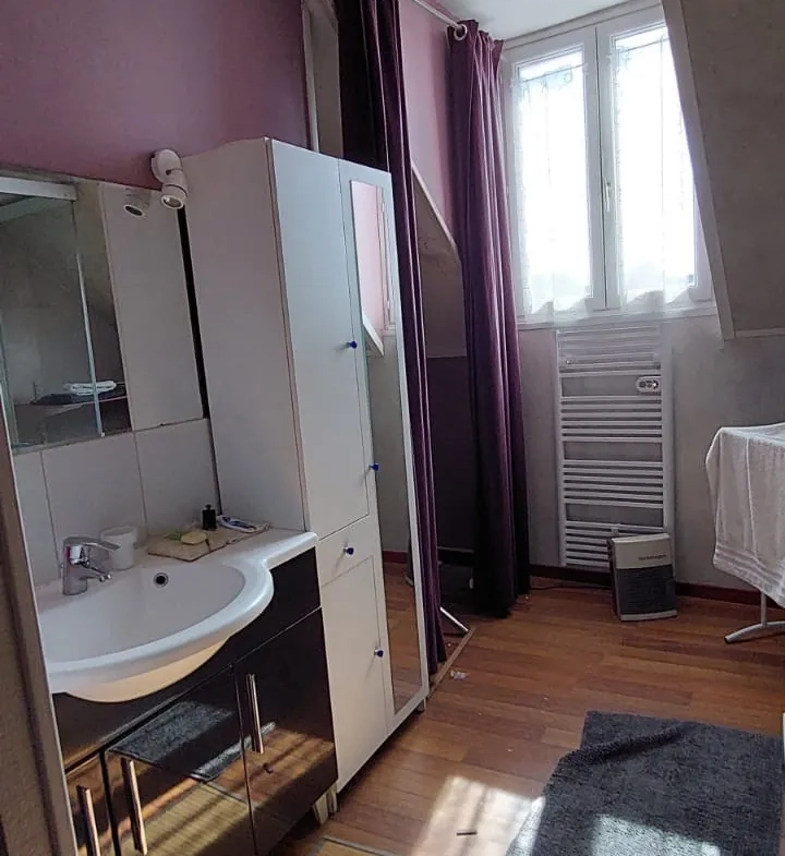 Maison spacieuse avec 3 chambres et 2 garages en centre-ville d'Abbeville 