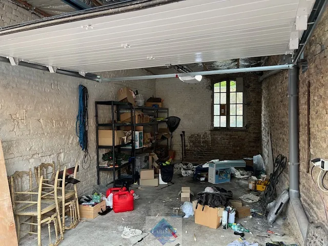Maison spacieuse avec 3 chambres et 2 garages en centre-ville d'Abbeville 