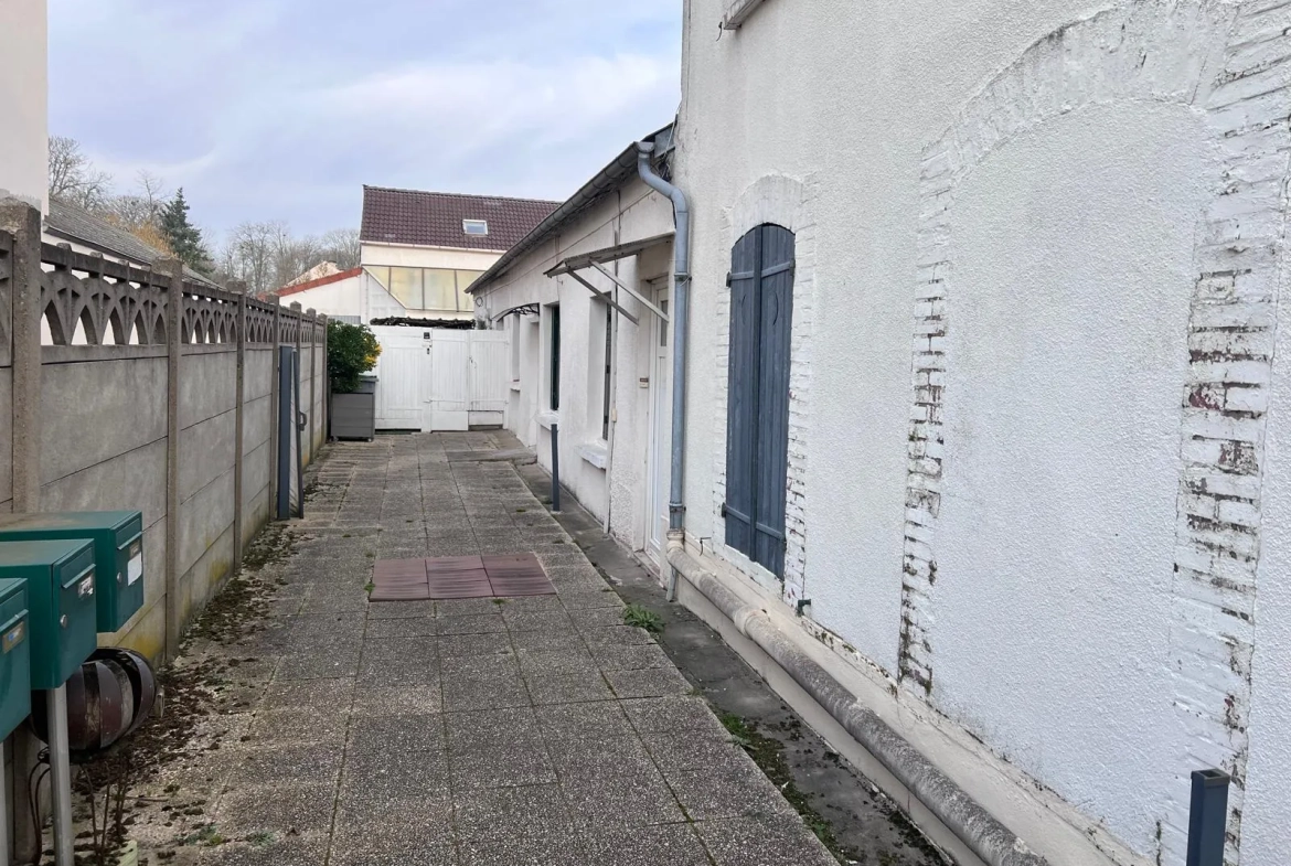 Immeuble de rapport à Angerville – 4 logements et 4 garages, bon rendement locatif 