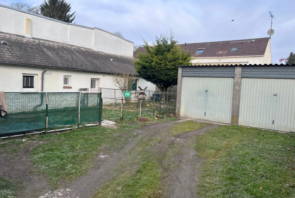Immeuble de rapport à Angerville – 4 logements et 4 garages, bon rendement locatif 