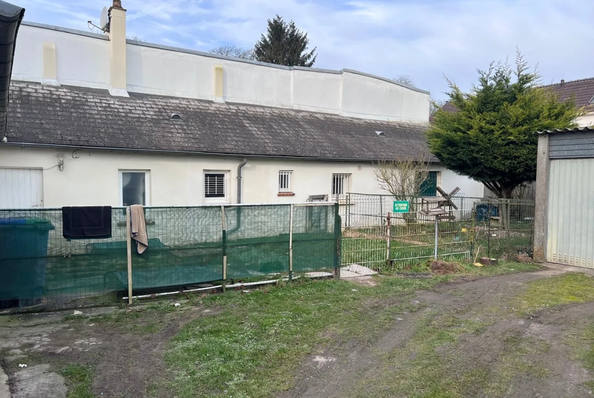 Immeuble de rapport à Angerville – 4 logements et 4 garages, bon rendement locatif 