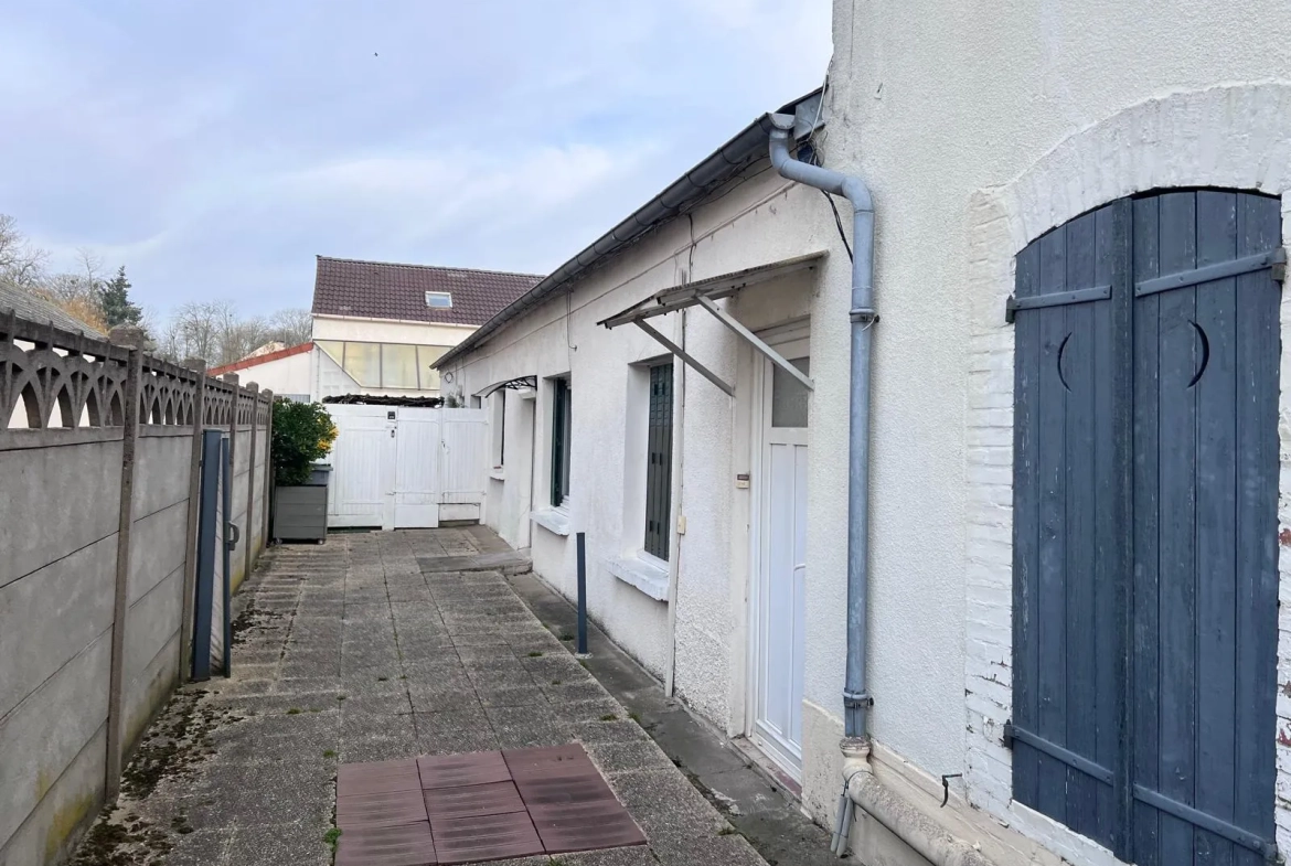 Immeuble de rapport à Angerville – 4 logements et 4 garages, bon rendement locatif 