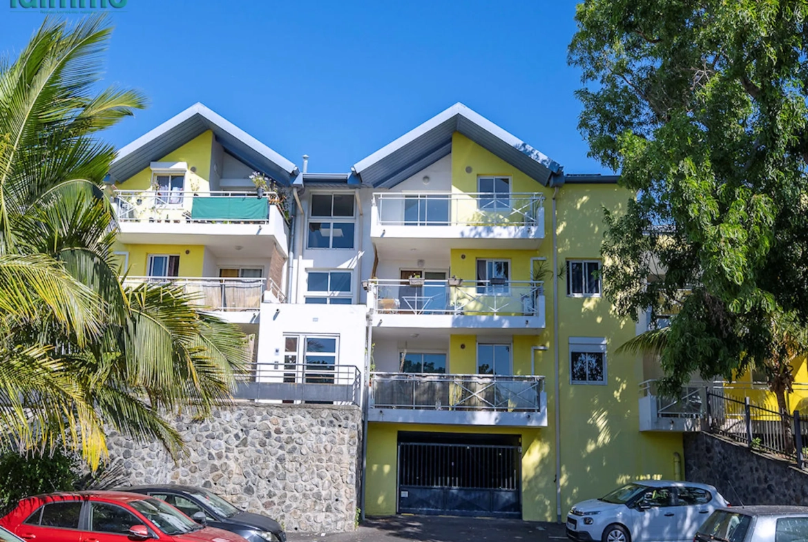 Appartement T2 avec varangue et parking à Sainte Clotilde - Résidence de 2013 