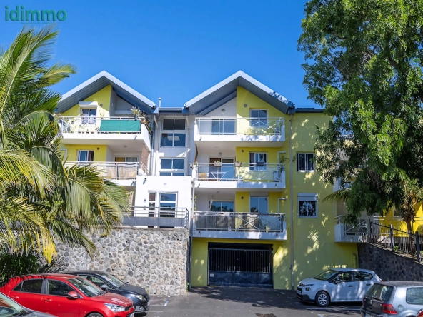 Appartement T2 avec varangue et parking à Sainte Clotilde - Résidence de 2013