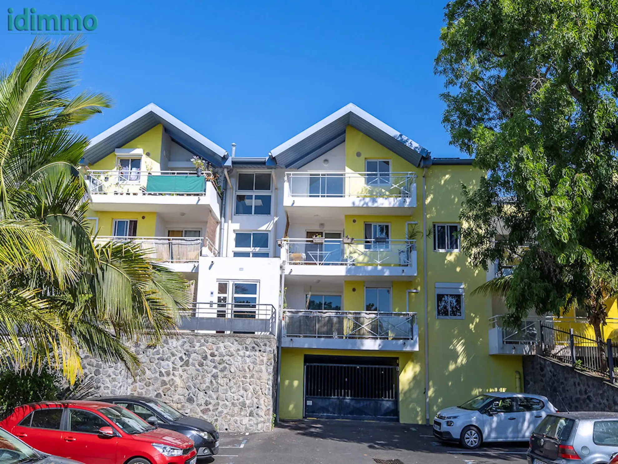 Appartement T2 avec varangue et parking à Sainte Clotilde - Résidence de 2013 
