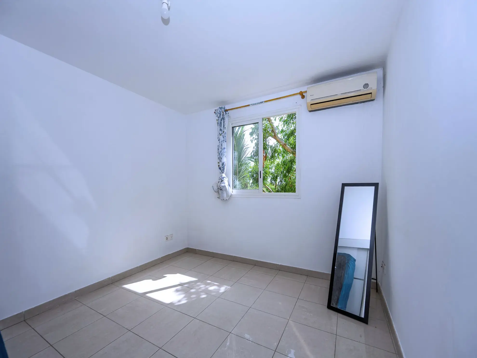 Appartement T2 avec varangue et parking à Sainte Clotilde - Résidence de 2013 