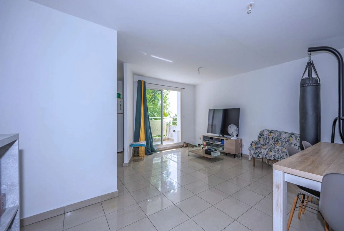 Appartement T2 avec varangue et parking à Sainte Clotilde - Résidence de 2013 