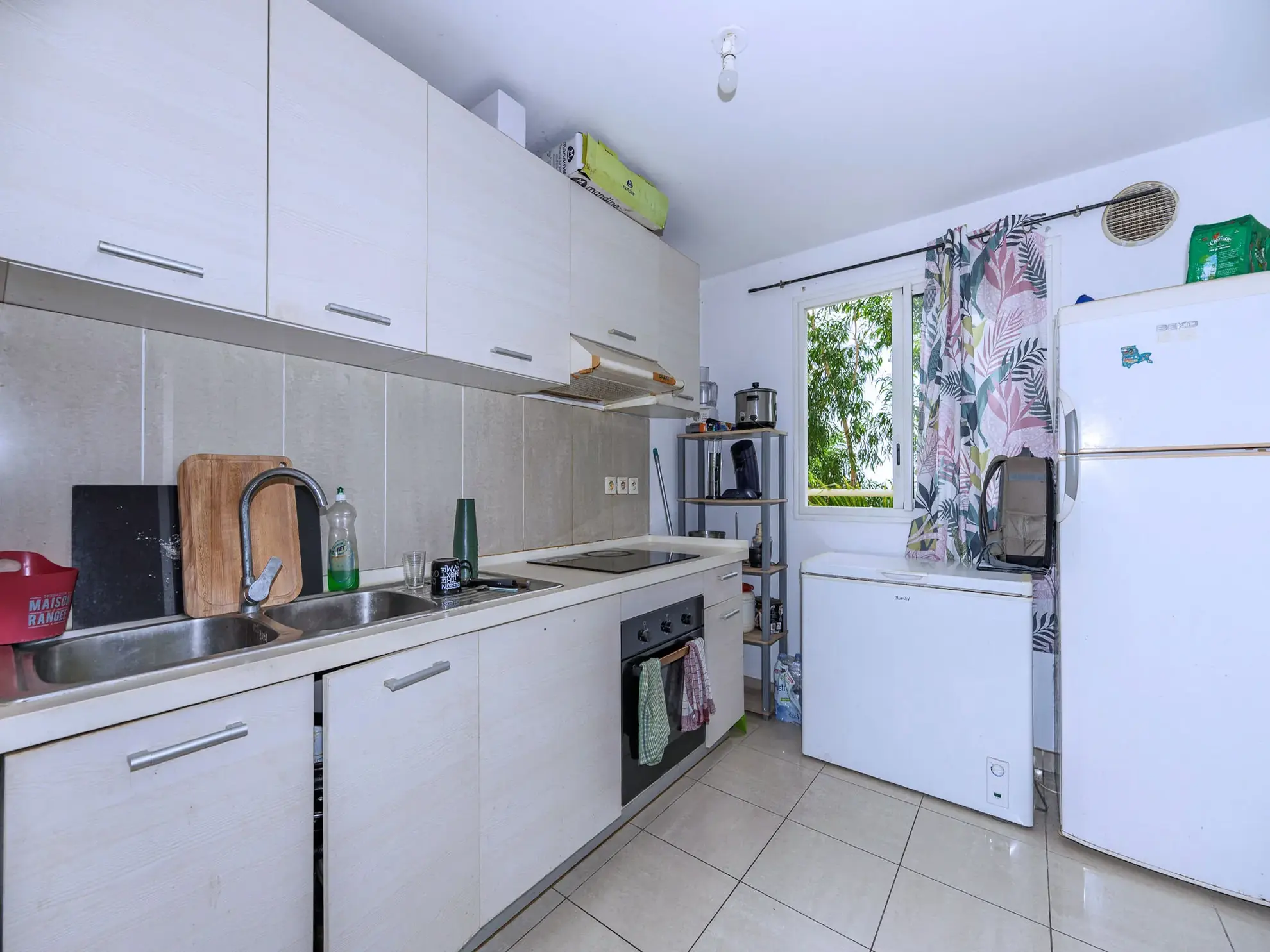 Appartement T2 avec varangue et parking à Sainte Clotilde - Résidence de 2013 
