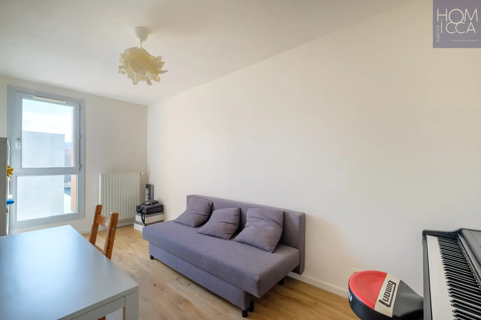 Appartement T3 récent de 60,63 m² avec balcon et parking à Lyon 9e 