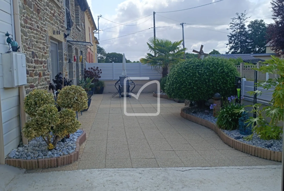 Maison en pierre avec 4 chambres, grand terrain et jardin paysagé à Evriguet 