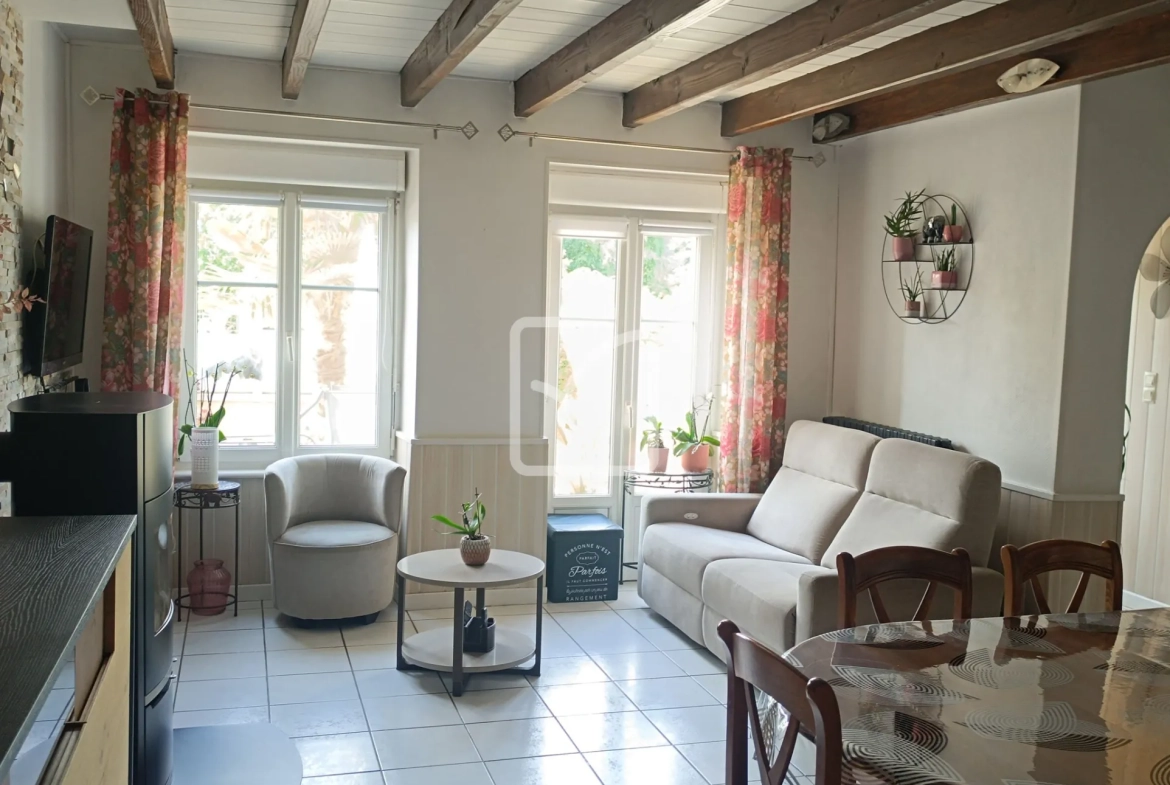 Maison en pierre avec 4 chambres, grand terrain et jardin paysagé à Evriguet 