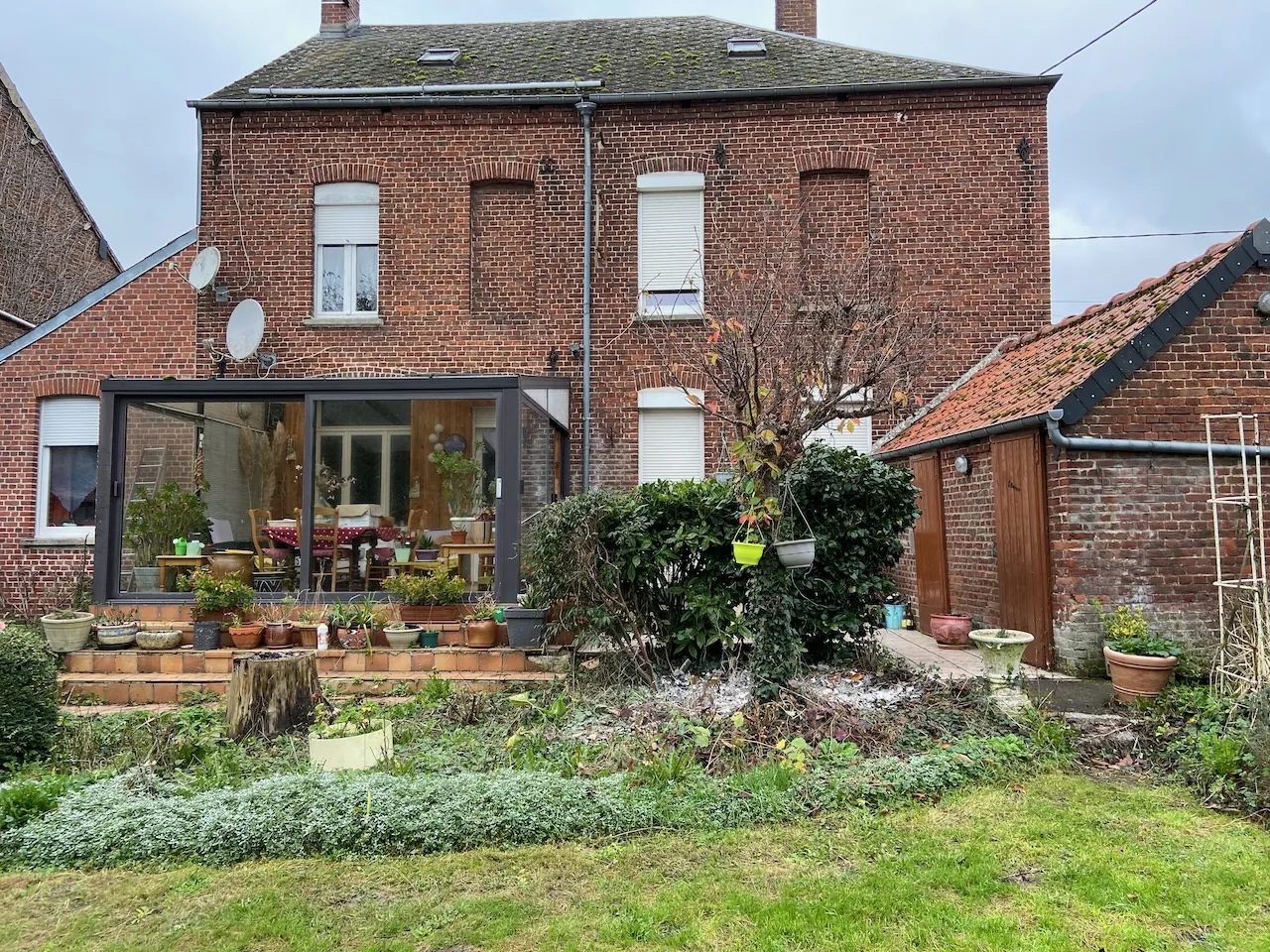 Maison à vendre à Bavay : 4 chambres, garage, véranda, dépendances, belle espace de vie 