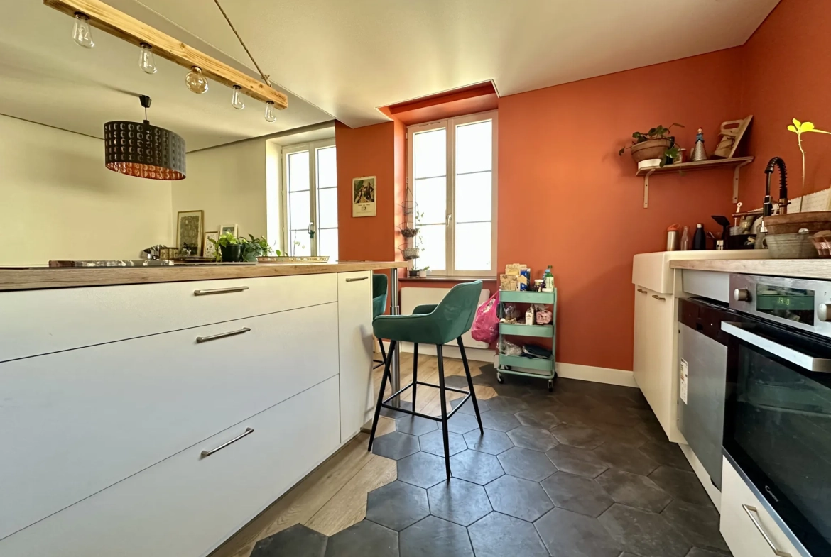 Maison à vendre à Beaumont centre avec terrasse et rénovations récentes 