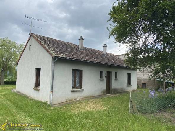 Maison de plain-pied à Saint-Dier-D'Auvergne avec jardin et garage