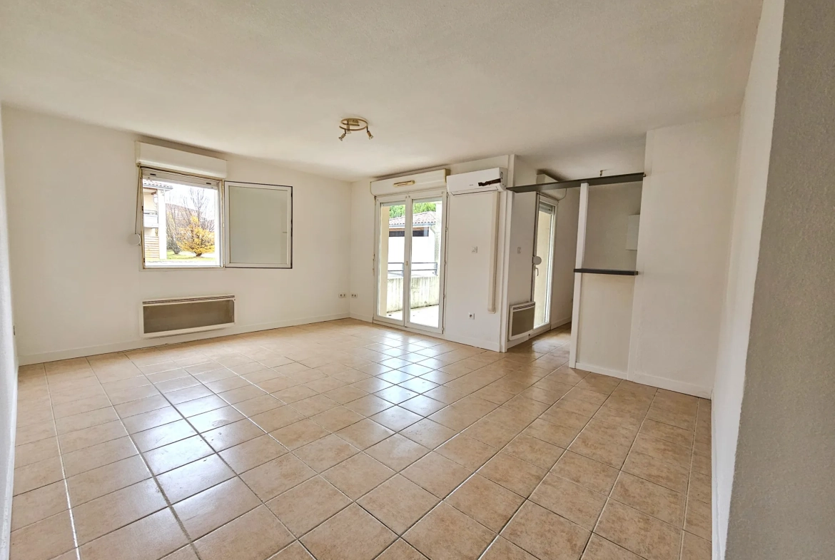Appartement T3 en rez-de-chaussée avec balcon et parking à Carcassonne 
