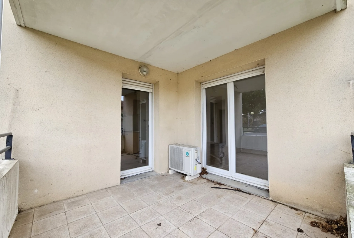 Appartement T3 en rez-de-chaussée avec balcon et parking à Carcassonne 