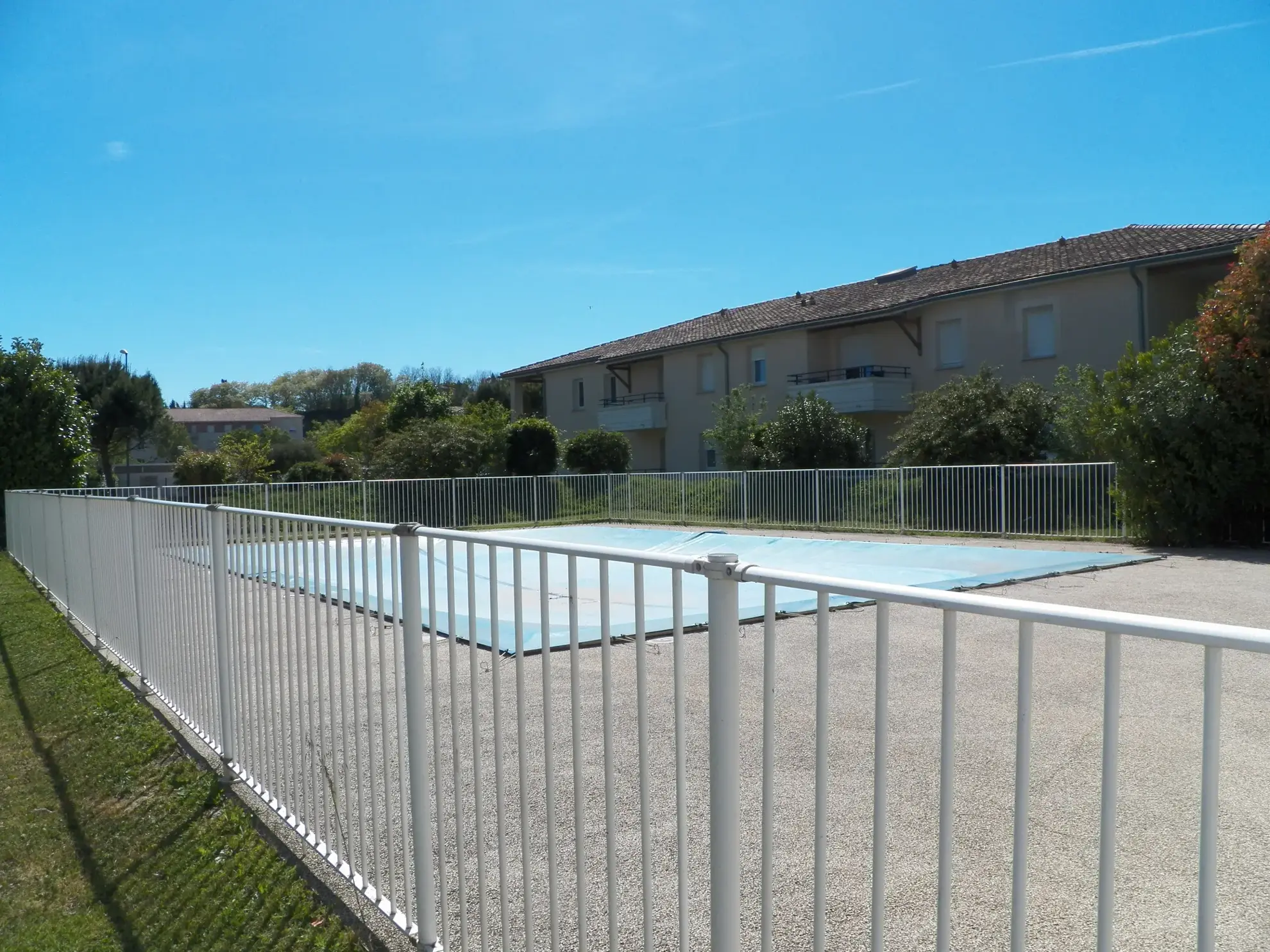 Appartement T3 en rez-de-chaussée avec balcon et parking à Carcassonne 