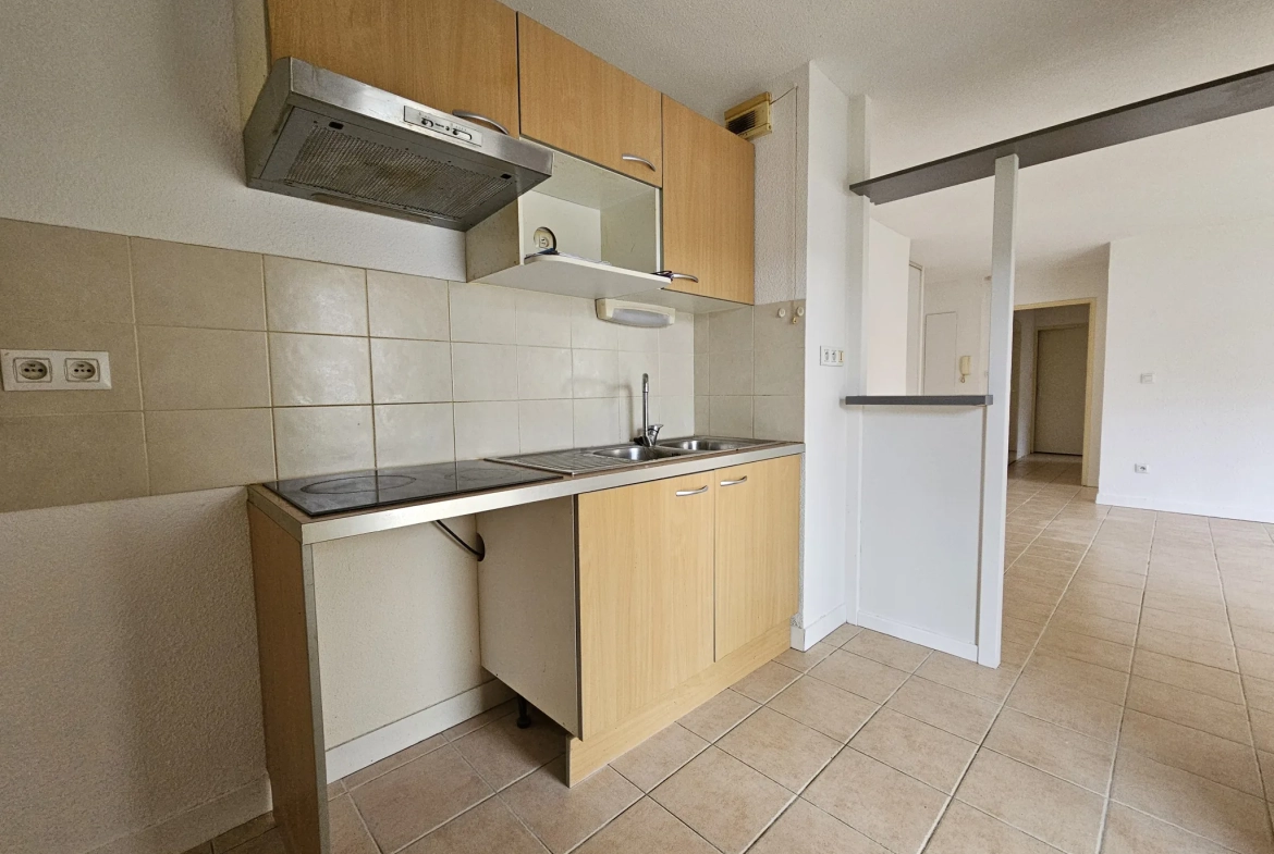 Appartement T3 en rez-de-chaussée avec balcon et parking à Carcassonne 