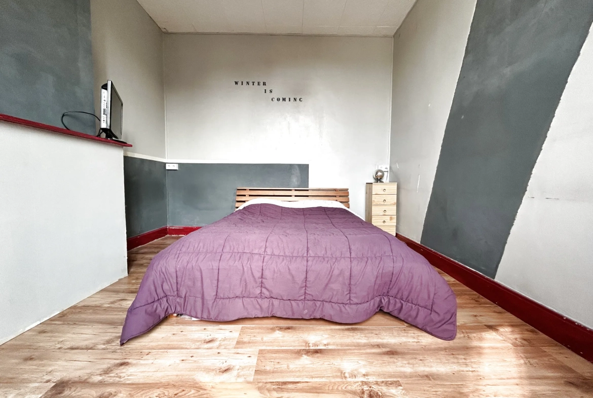 Maison familiale à vendre à Hénin Beaumont avec jardin et double garage 