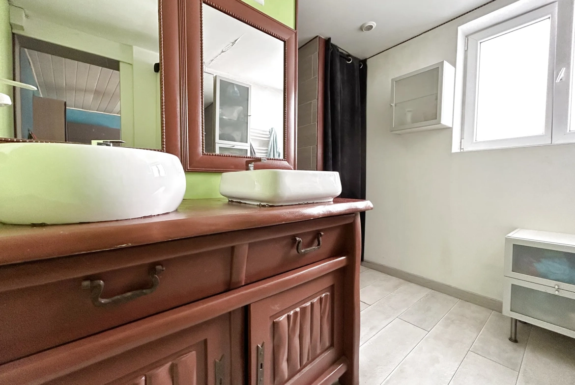Maison familiale à vendre à Hénin Beaumont avec jardin et double garage 