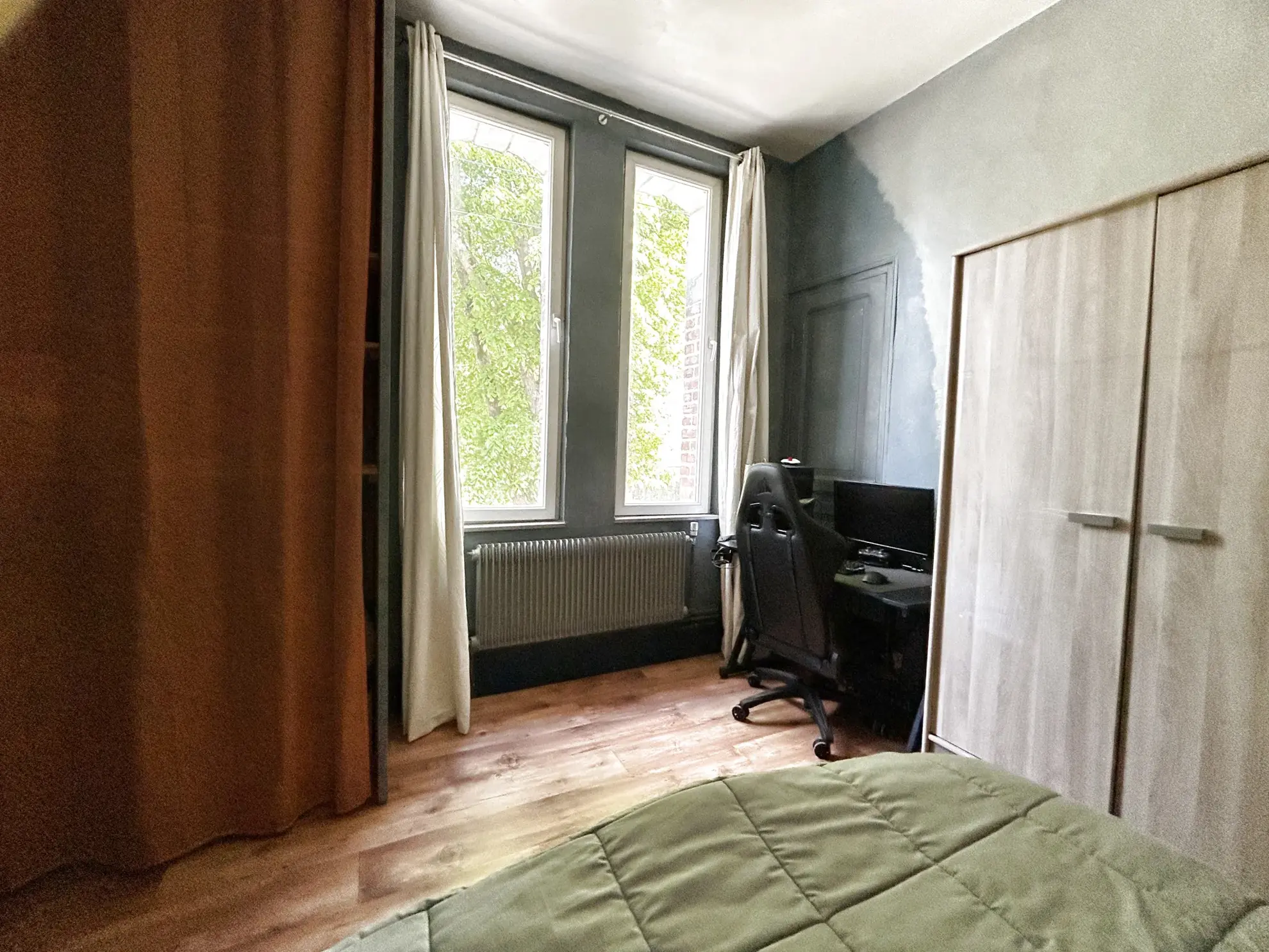 Maison familiale à vendre à Hénin Beaumont avec jardin et double garage 