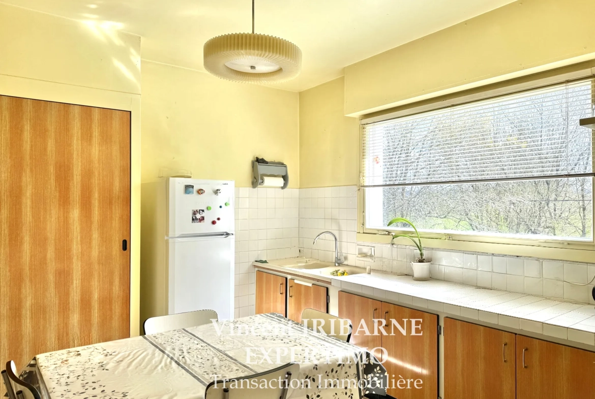 Maison 3 chambres avec garage et jardin à Saintes, environnement calme 