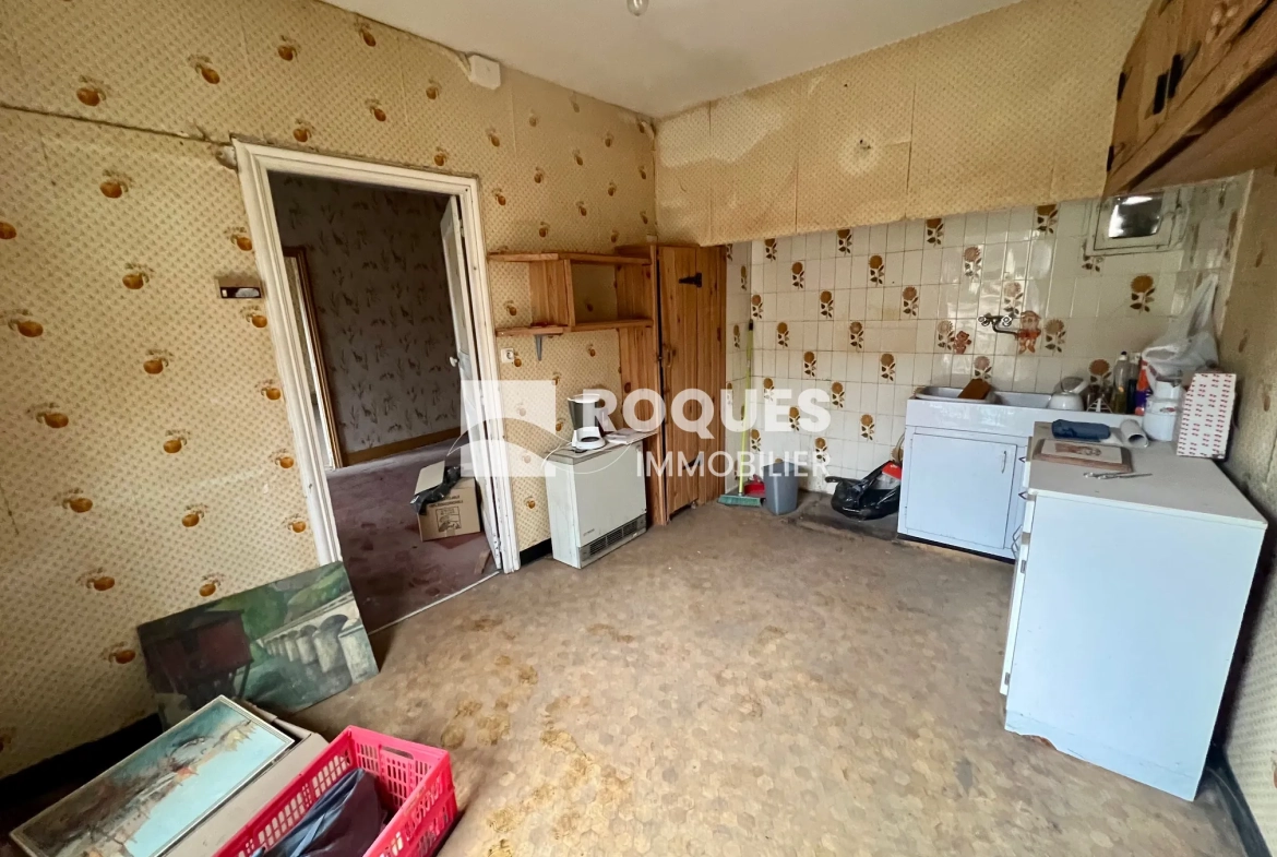 Appartement T2 à rénover de 44 m² avec terrasse à Millau 
