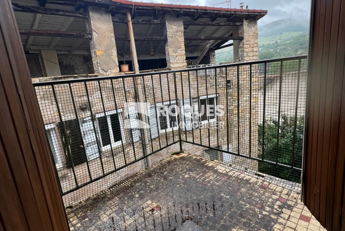 Appartement T2 à rénover de 44 m² avec terrasse à Millau 