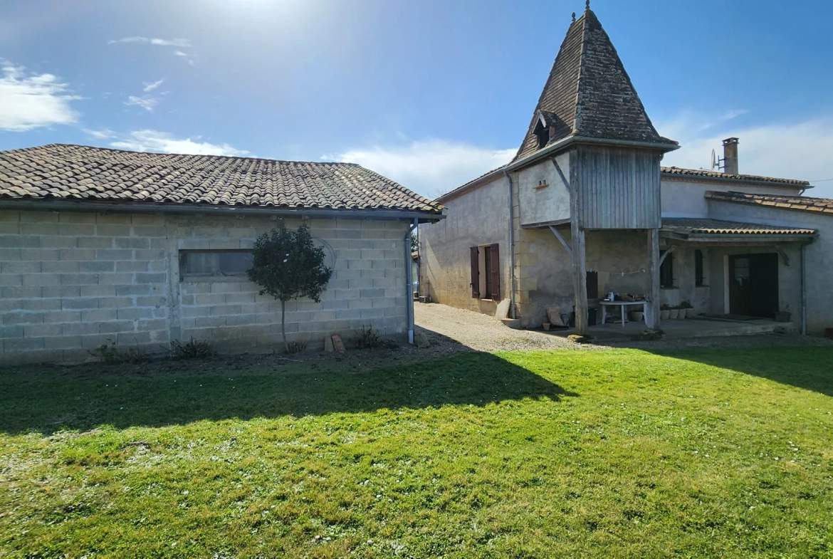 Belle maison en pierre avec terrain et atelier à Tonneins 