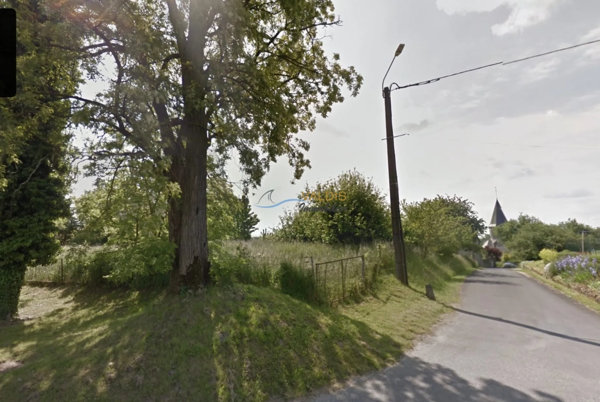Terrain à bâtir plat de 700 m² à Juvigny, calme et constructible 