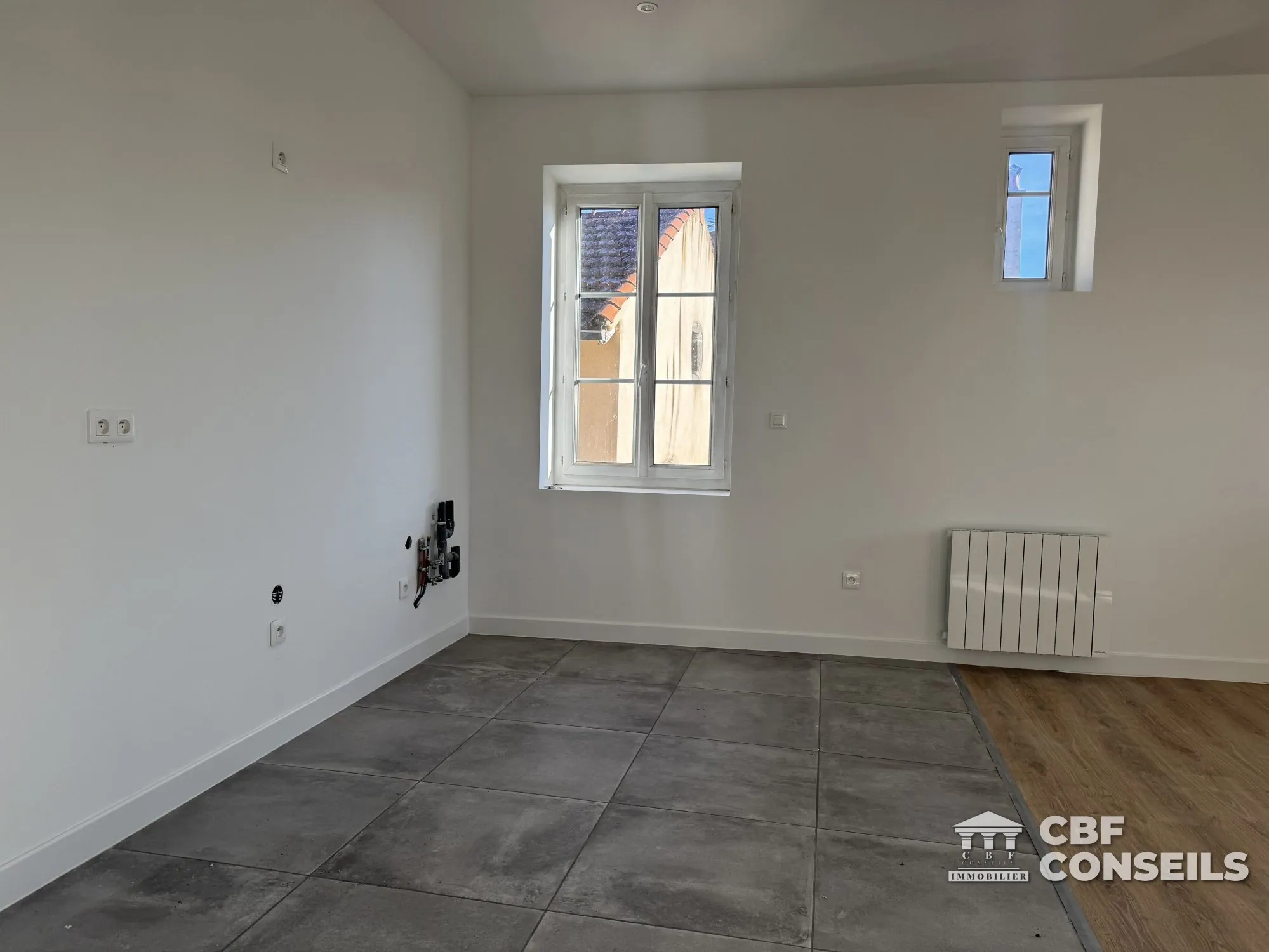 Appartement T3 rénové à Riom (63200), centre-ville avec vue et potentiel d'aménagement 