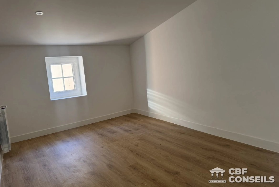 Appartement T3 rénové à Riom (63200), centre-ville avec vue et potentiel d'aménagement 